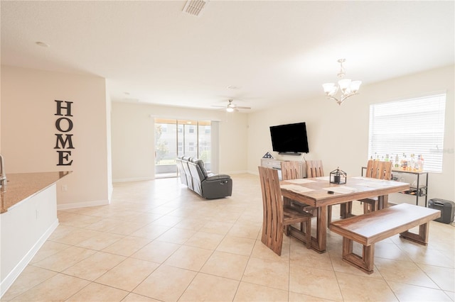 4928 Cortland Dr, Davenport, FL 33837 - dining room with a chandelier, ceiling fan, and light tile patterned flooring