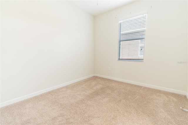 4928 Cortland Dr, Davenport, FL 33837 - unfurnished room with light colored carpet and baseboards