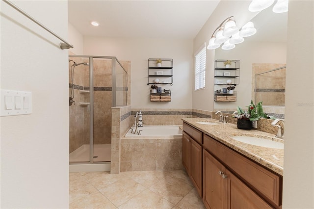 4928 Cortland Dr, Davenport, FL 33837 - full bathroom featuring tile patterned floors, a garden tub, a shower stall, and double vanity