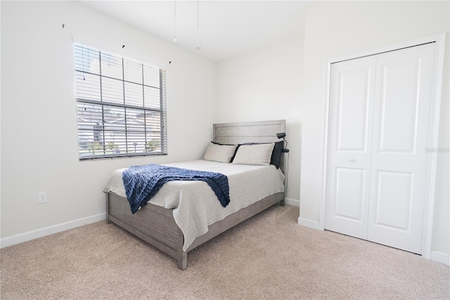 4928 Cortland Dr, Davenport, FL 33837 - bedroom with light carpet and a closet