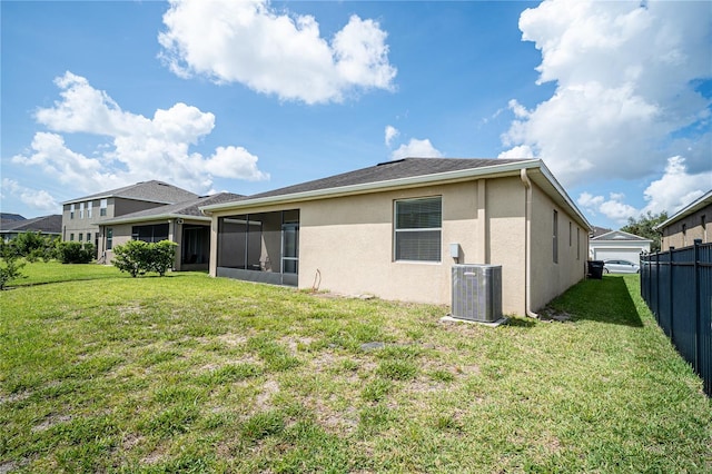 4928 Cortland Dr, Davenport, FL 33837 - rear view of house featuring stucco siding and a sunroom