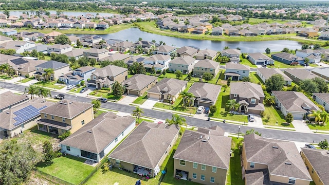 4928 Cortland Dr, Davenport, FL 33837 - aerial perspective of suburban area with a large body of water