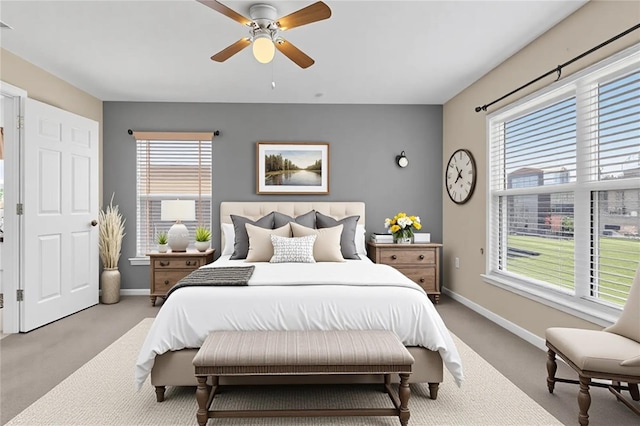 107 Whitehall Way, Kissimmee, FL 34758 - carpeted bedroom featuring multiple windows and ceiling fan