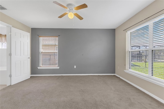 107 Whitehall Way, Kissimmee, FL 34758 - carpeted spare room with healthy amount of natural light and ceiling fan