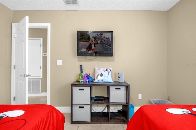 2737 N Poinciana Blvd Unit 92, Kissimmee, FL 34746 - bedroom with tile patterned flooring