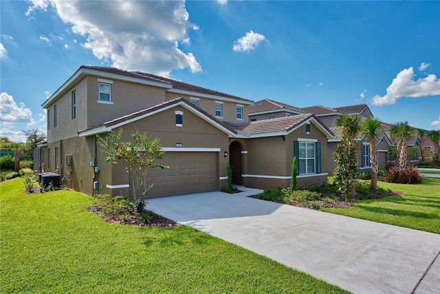 5231 Wildwood Way, Davenport, FL 33837 - view of front of house featuring stucco siding, concrete driveway, a front lawn, and an attached garage