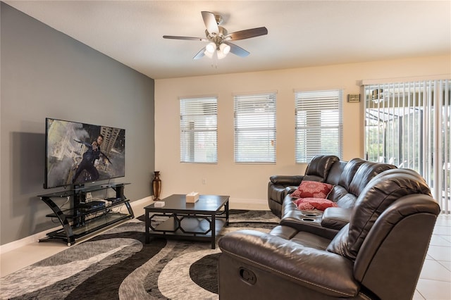 5231 Wildwood Way, Davenport, FL 33837 - living room with a ceiling fan and baseboards