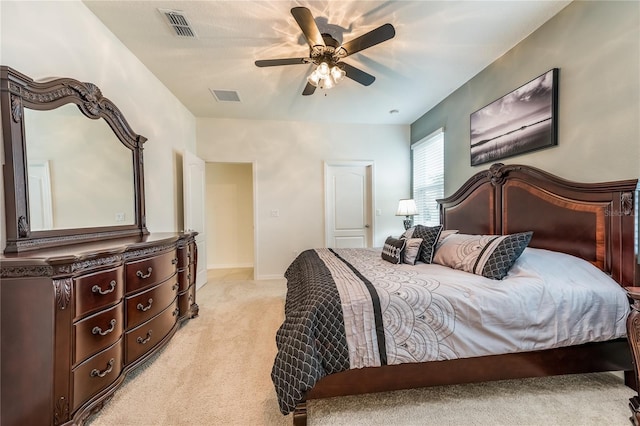 5231 Wildwood Way, Davenport, FL 33837 - bedroom with light carpet and ceiling fan