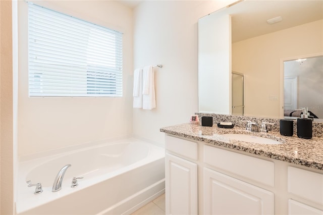 5231 Wildwood Way, Davenport, FL 33837 - bathroom featuring vanity and a bath