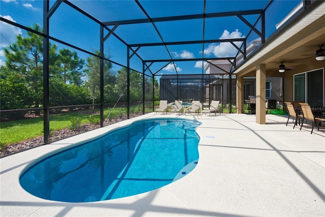 5231 Wildwood Way, Davenport, FL 33837 - outdoor pool with a patio, a ceiling fan, and a lanai