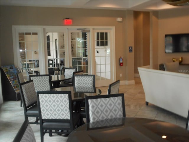 5231 Wildwood Way, Davenport, FL 33837 - dining room featuring french doors and light tile patterned floors