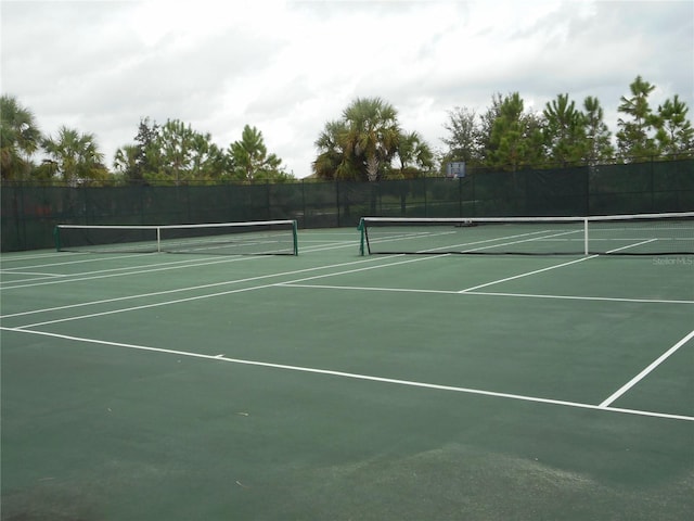 5231 Wildwood Way, Davenport, FL 33837 - view of tennis court with community basketball court