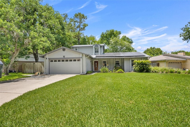 878 Elgin Dr, Winter Springs, FL 32708 - traditional home with an attached garage, stucco siding, roof mounted solar panels, and driveway