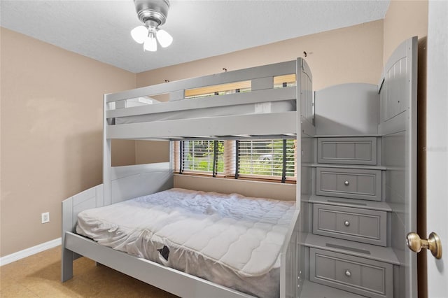 878 Elgin Dr, Winter Springs, FL 32708 - bedroom featuring baseboards and a textured ceiling