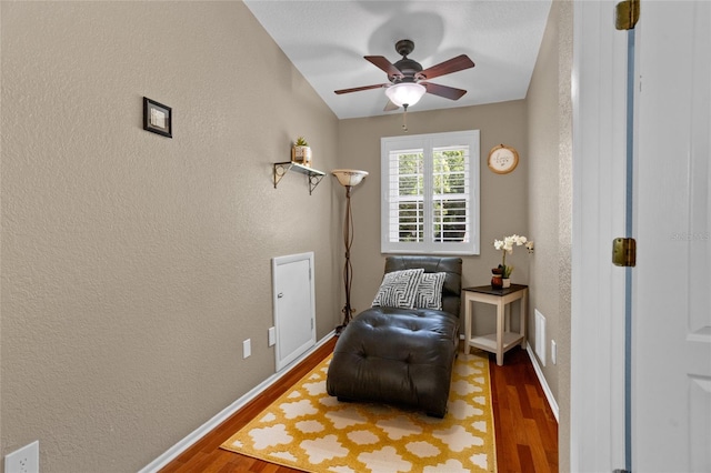 878 Elgin Dr, Winter Springs, FL 32708 - sitting room featuring wood finished floors, a textured wall, and ceiling fan