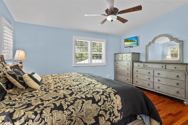 878 Elgin Dr, Winter Springs, FL 32708 - bedroom featuring dark wood finished floors, lofted ceiling, and ceiling fan