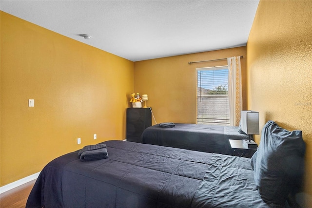 2867 Club Cortile Cir, Kissimmee, FL 34746 - bedroom with wood finished floors and baseboards