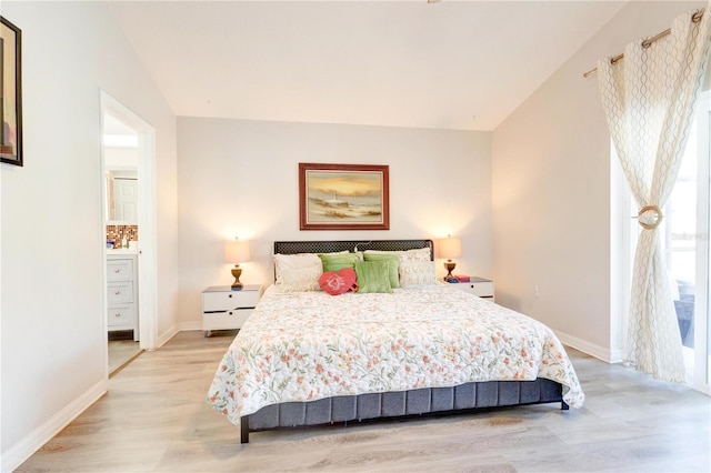 1014 Prey Ct, Kissimmee, FL 34746 - bedroom with light wood-type flooring and baseboards