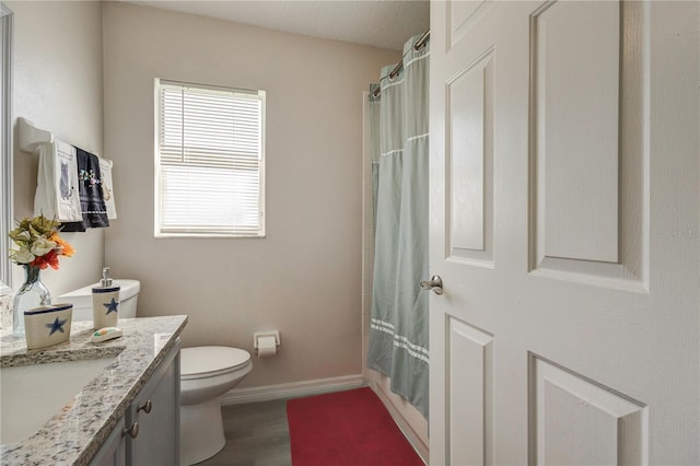 1014 Prey Ct, Kissimmee, FL 34746 - bathroom with vanity, wood finished floors, and a shower with curtain