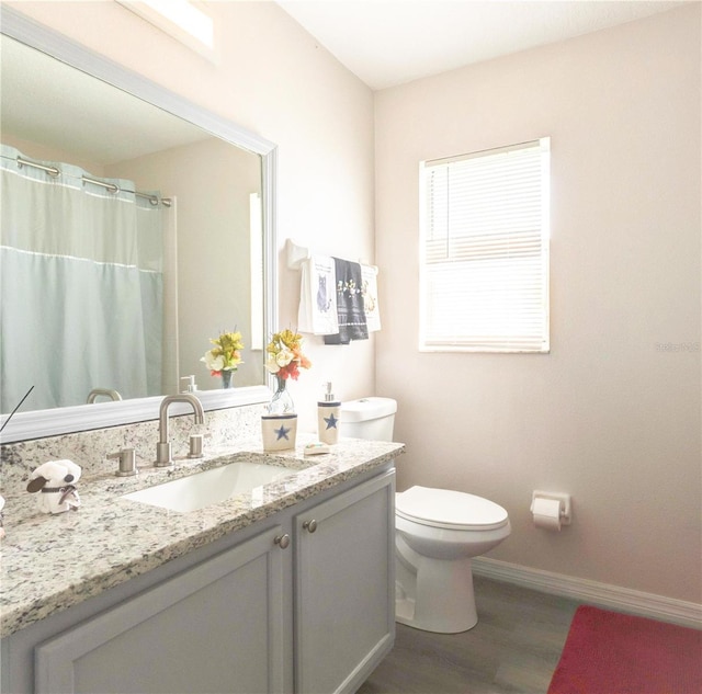 1014 Prey Ct, Kissimmee, FL 34746 - bathroom featuring wood finished floors and vanity