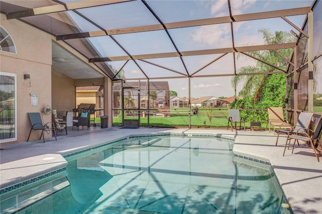 1014 Prey Ct, Kissimmee, FL 34746 - outdoor pool featuring a patio and a lanai