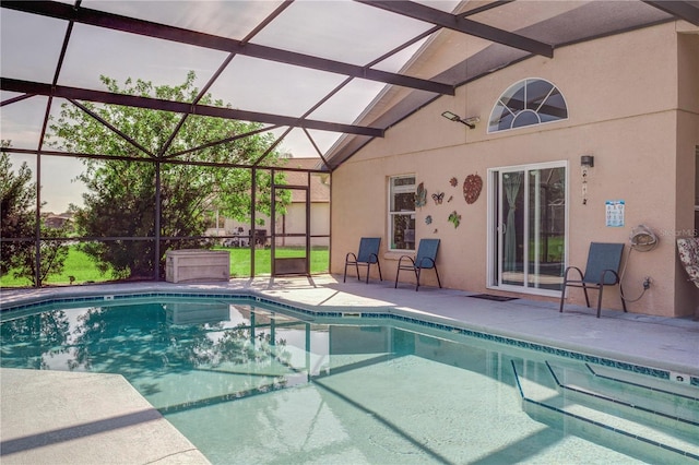 1014 Prey Ct, Kissimmee, FL 34746 - swimming pool with a patio area and glass enclosure