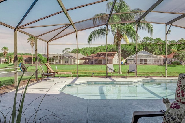 1014 Prey Ct, Kissimmee, FL 34746 - swimming pool featuring a lanai, a yard, and a patio area