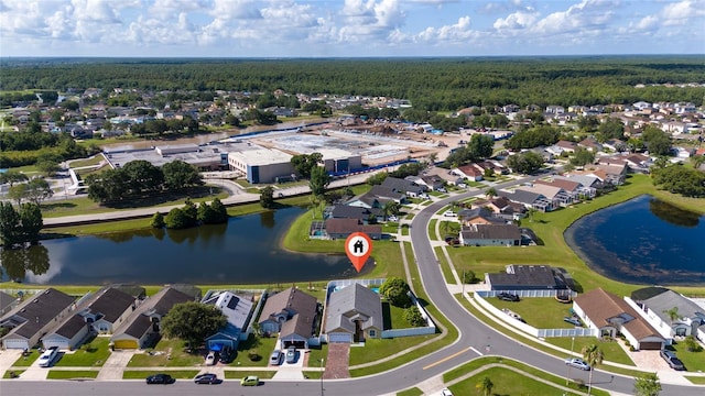 5100 Violet Ln, Kissimmee, FL 34758 - aerial view of residential area with a heavily wooded area and a large body of water
