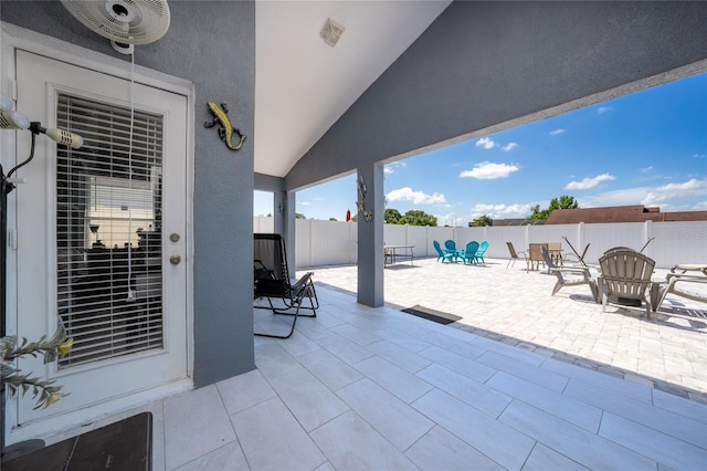 5100 Violet Ln, Kissimmee, FL 34758 - fenced backyard with a patio area and outdoor dining space