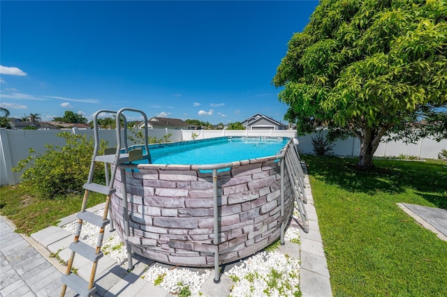 5100 Violet Ln, Kissimmee, FL 34758 - view of pool with a fenced backyard