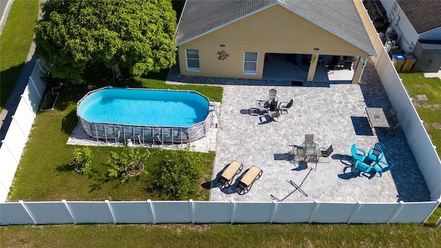 5100 Violet Ln, Kissimmee, FL 34758 - view of swimming pool with a patio area and a fenced backyard
