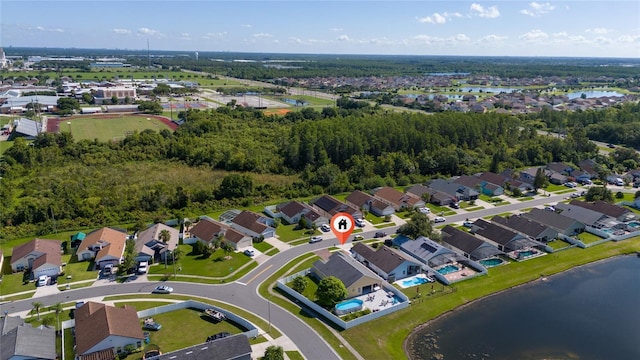 5100 Violet Ln, Kissimmee, FL 34758 - aerial view of property's location with nearby suburban area and a large body of water