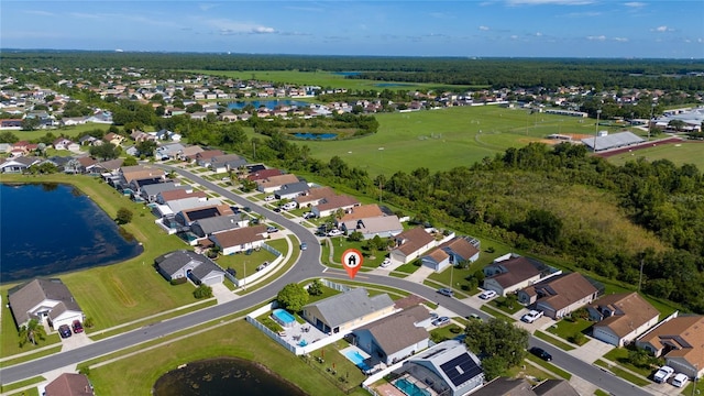 5100 Violet Ln, Kissimmee, FL 34758 - aerial view of property's location with nearby suburban area and a large body of water