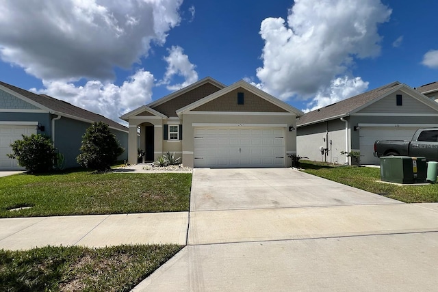 2727 Harmonia Hammock Rd, Harmony, FL 34773 - view of front of property featuring an attached garage, concrete driveway, a front lawn, and stucco siding
