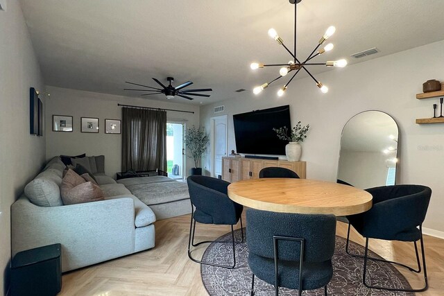2727 Harmonia Hammock Rd, Harmony, FL 34773 - living area featuring a chandelier and arched walkways