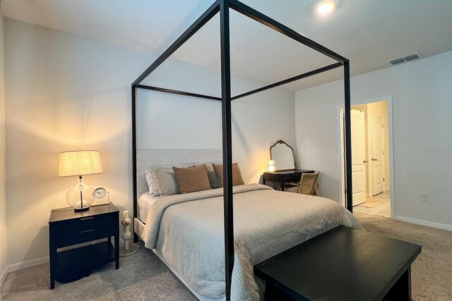 2727 Harmonia Hammock Rd, Harmony, FL 34773 - carpeted bedroom featuring baseboards and ensuite bathroom