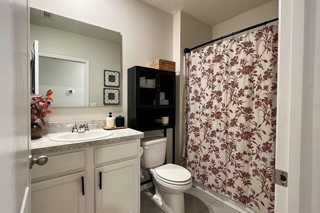 2727 Harmonia Hammock Rd, Harmony, FL 34773 - bathroom with vanity, tile patterned flooring, and a shower with curtain