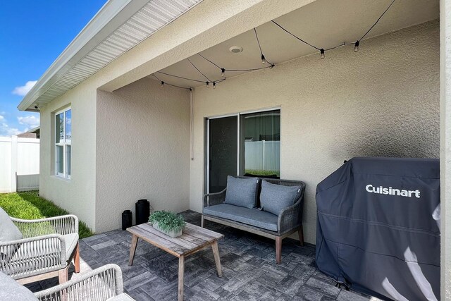 2727 Harmonia Hammock Rd, Harmony, FL 34773 - view of patio featuring an outdoor hangout area and a grill