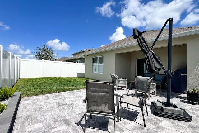 2727 Harmonia Hammock Rd, Harmony, FL 34773 - fenced backyard featuring a patio area