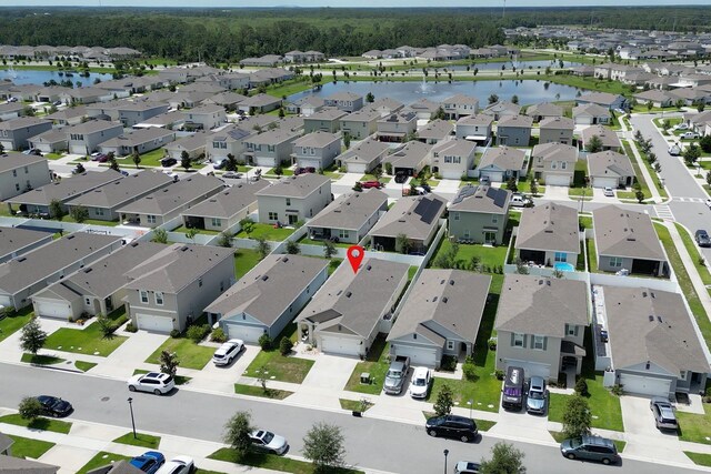 2727 Harmonia Hammock Rd, Harmony, FL 34773 - aerial view of property and surrounding area with a nearby body of water and nearby suburban area