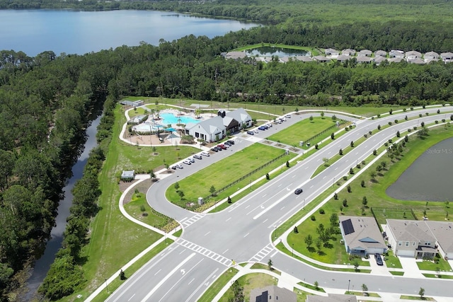 2727 Harmonia Hammock Rd, Harmony, FL 34773 - drone / aerial view of a heavily wooded area and a large body of water