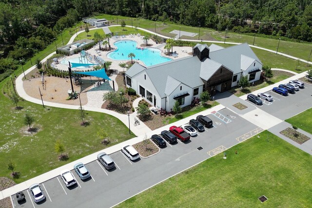 2727 Harmonia Hammock Rd, Harmony, FL 34773 - aerial view of a pool area and a heavily wooded area