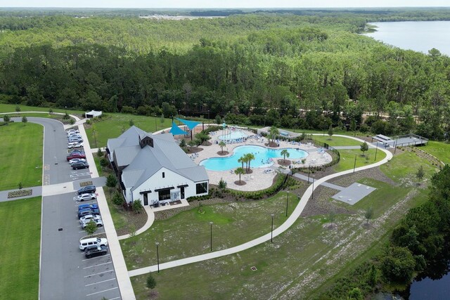 2727 Harmonia Hammock Rd, Harmony, FL 34773 - drone / aerial view of a forest and a large body of water