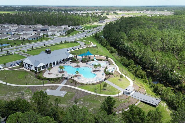 2727 Harmonia Hammock Rd, Harmony, FL 34773 - aerial view of property and surrounding area featuring a pool