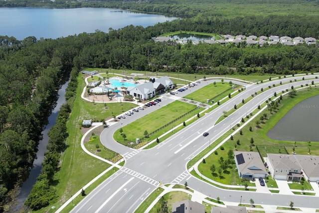 2727 Harmonia Hammock Rd, Harmony, FL 34773 - bird's eye view of a forest and a large body of water