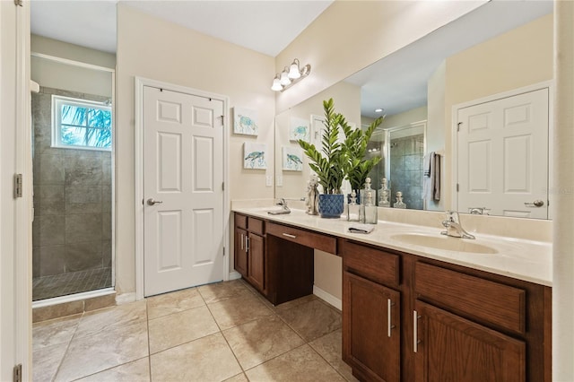 256 Yellow Snapdragon Dr, Davenport, FL 33837 - full bathroom with a stall shower, double vanity, and tile patterned flooring
