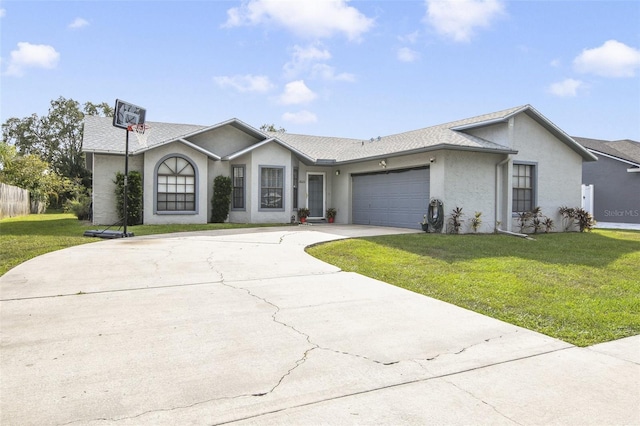 2626 Gentre St, Kissimmee, FL 34744 - ranch-style house with stucco siding, a front lawn, an attached garage, and driveway
