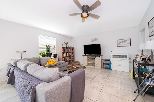 1959 Cricket Cradle Dr, Kissimmee, FL 34746 - living room with light tile patterned floors and a ceiling fan