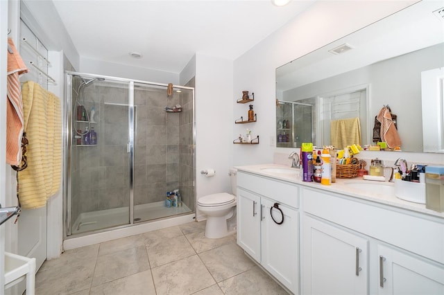 1959 Cricket Cradle Dr, Kissimmee, FL 34746 - bathroom with double vanity, a shower stall, and tile patterned floors