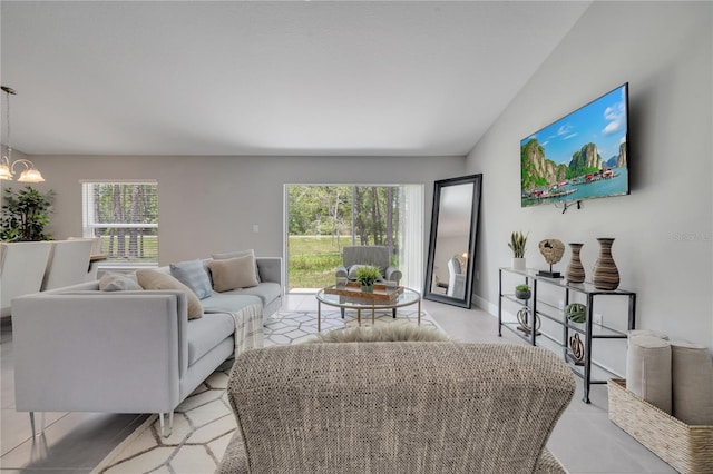 33 Peterlee Ct, Kissimmee, FL 34758 - living room featuring a chandelier